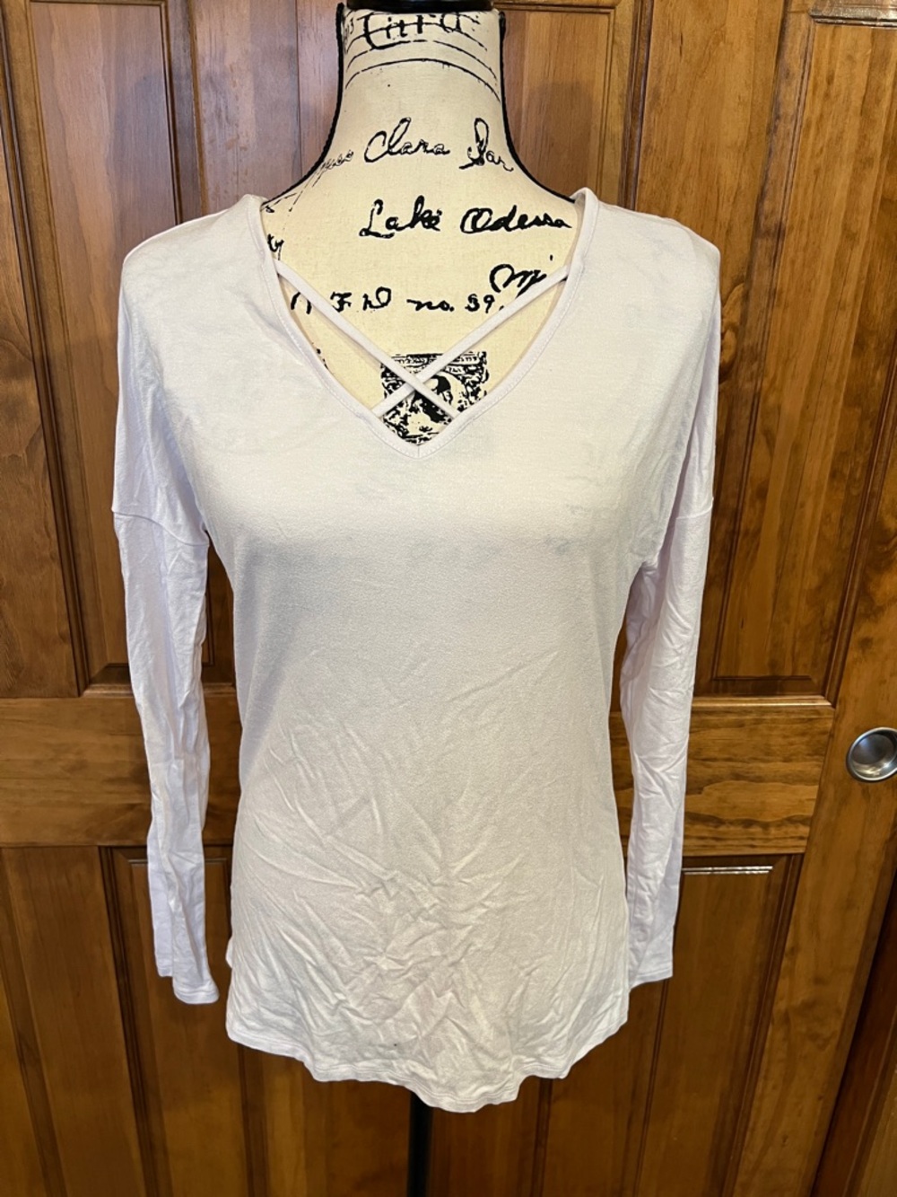 White Long-Sleeve V-Neck Top with Crisscross Detail